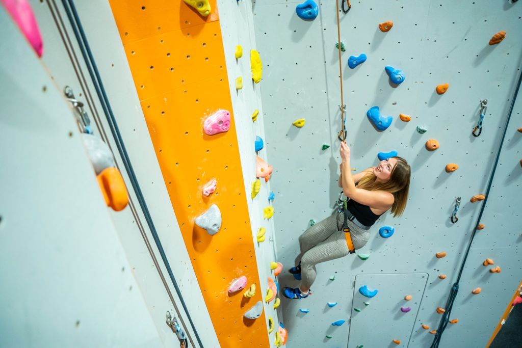 Child climbing at UL Climbing Wall summer camp